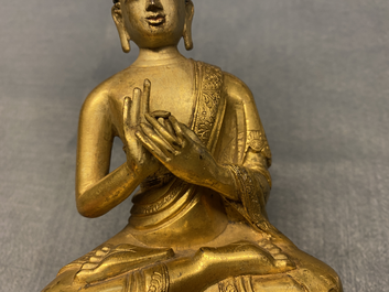 A Chinese gilt bronzen figure of Buddha, Kangxi